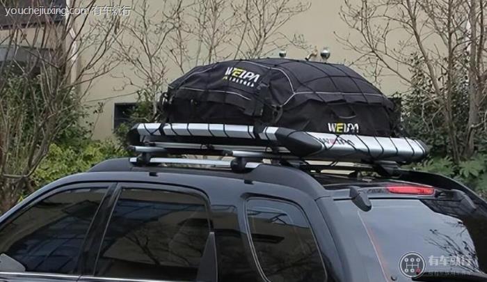 suv车顶两条杠能不能装行李